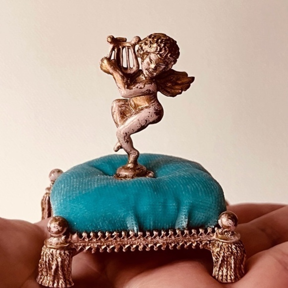Vintage Florentine cherub figurine pin holder. Rare